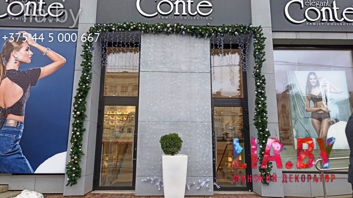 Украшение фасадов магазинов Conte к новому году световыми и хвойными гирляндами